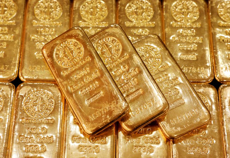 Gold gets a safety boost as a downgrade by Fitch Ratings in the US shakes up the markets